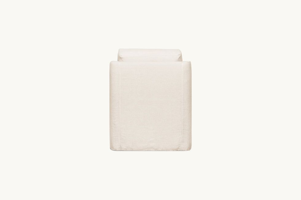Back view of Esme Glider Chair in Corn Silk, a light beige Washed Cotton Linen