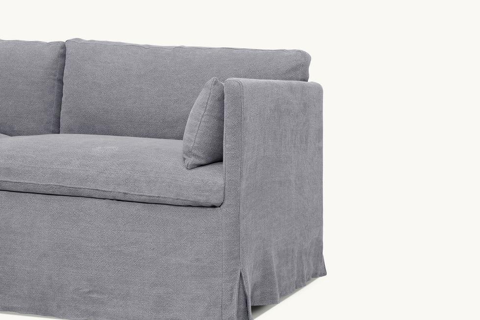 Close up view of Gabriel L-Shape Sectional Sofa in Ink Cap, a medium cool grey Light Weight Linen