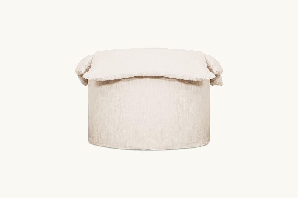 Back view of Loula Swivel Chair in Corn Silk, a light beige Washed Cotton Linen