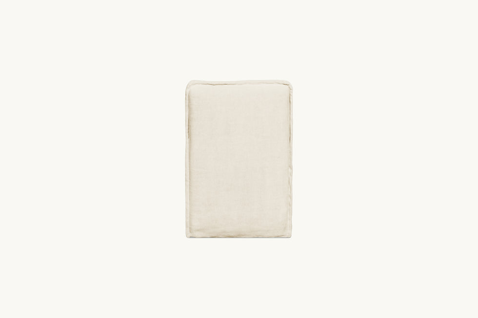 Back view of a Melo Dining Chair in Warm Oatmeal, a light warm beige Medium Weight Linen