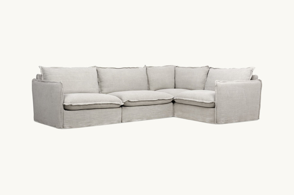 Front view of Neva L-Shape Sectional Sofa in Jasmine Rice, a light warm greige Medium Weight Linen