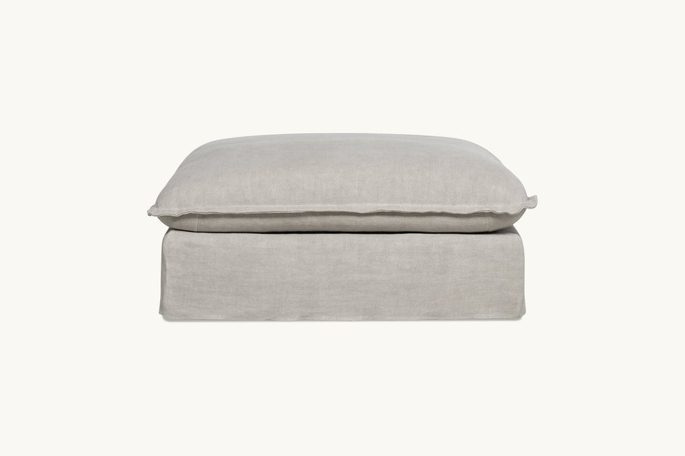 Front view of Neva Sectional Ottoman in Jasmine Rice, a light warm greige Medium Weight Linen
