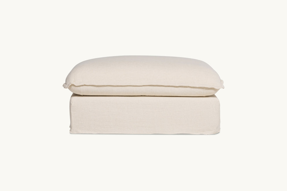 Front view of Neva Chair Ottoman in Corn Silk, a light beige Washed Cotton Linen