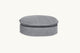 Slide #2 Front view of Neva Round Ottoman in Ink Cap, a medium cool grey Light Weight Linen