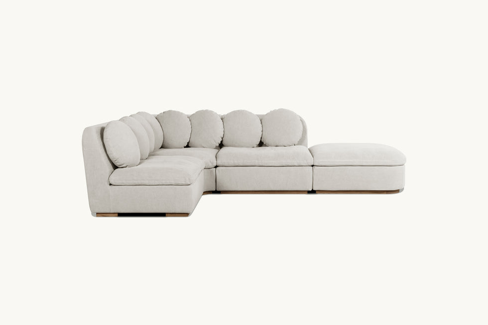 Side view of Olea L-Shape Sectional Sofa in Jasmine Rice, a light warm greige Medium Weight Linen