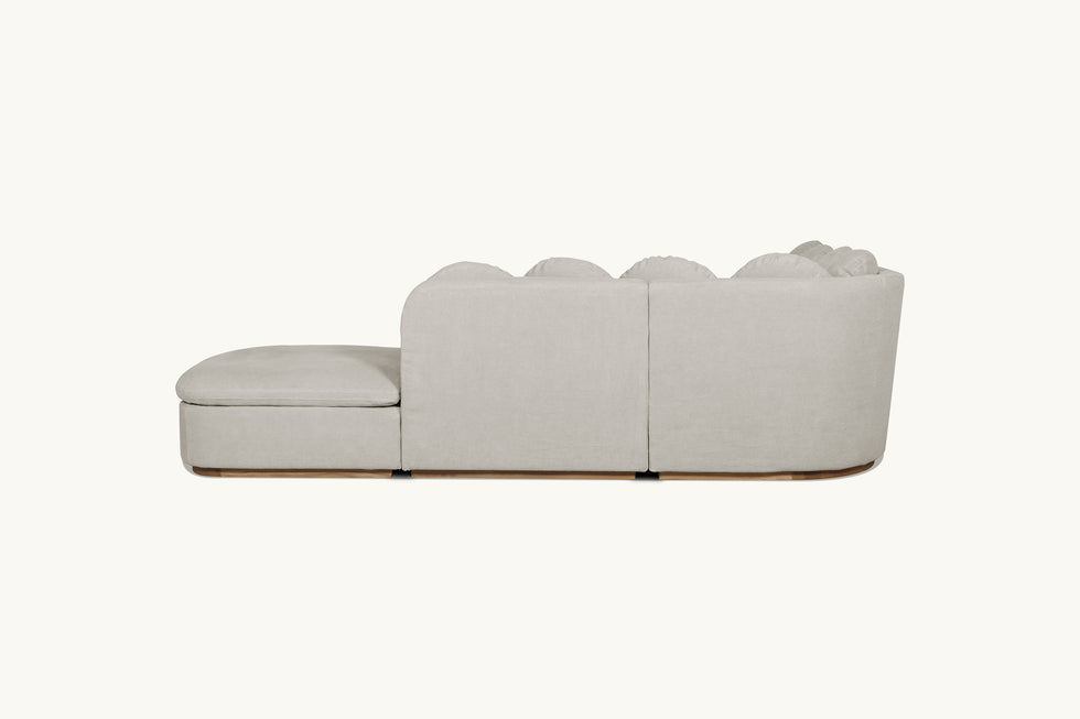 Back view of Olea L-Shape Sectional Sofa in Jasmine Rice, a light warm greige Medium Weight Linen