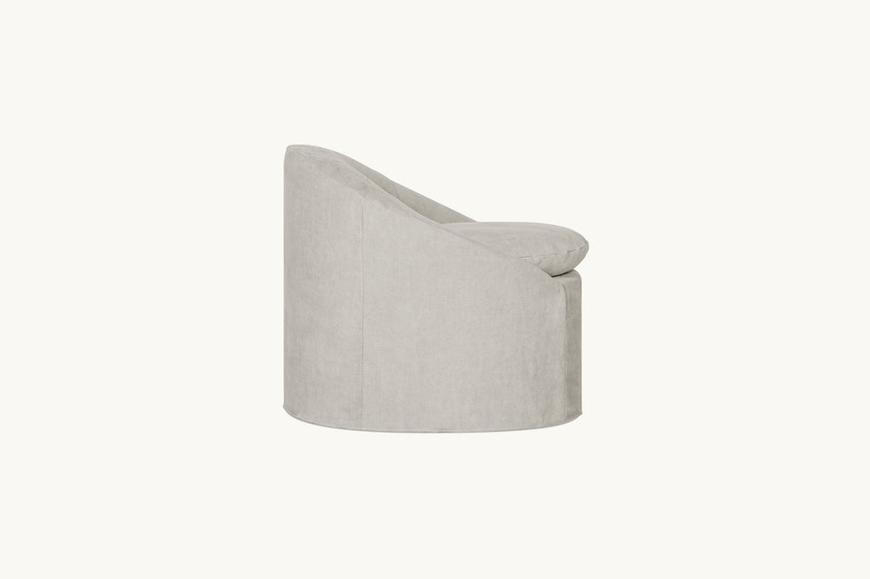 Side view of Ozzi Chair in Jasmine Rice, a light warm greige Medium Weight Linen